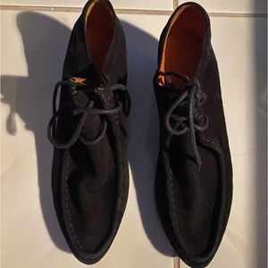 Gentle Souls , black suede booties with wedge heel.